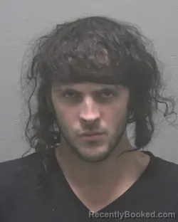 Mugshot of Kaan Michael Ozerkan booked in New Hanover County, North Carolina on September 10, 2026
