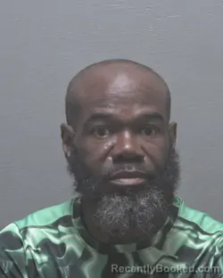 Mugshot of JOMO KENYATTA HAMLET booked in New Hanover County, North Carolina on March 24, 2026