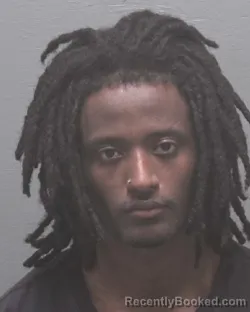 Mugshot of HENOK DAWIT MARTINEZ booked in New Hanover County, North Carolina on March 21, 2026