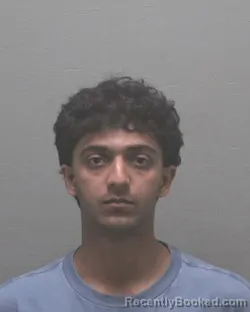 Mugshot of JOSHUA EDAKADAVIL THOMAS booked in New Hanover County, North Carolina on March 22, 2026