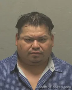 Mugshot of JUAN CARLOS SANTES booked in New Hanover County, North Carolina on April 7, 2026