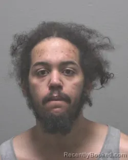 Mugshot of JEVON BARRRINGTON MCMILLIAN booked in New Hanover County, North Carolina on April 8, 2026