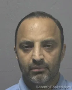Mugshot of HARRY MOZAFARI booked in New Hanover County, North Carolina on May 30, 2026