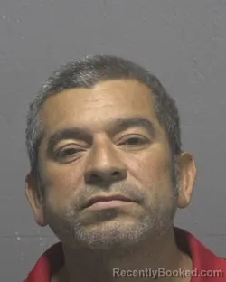 Mugshot of CARLOS SANSORES-GARCIA booked in New Hanover County, North Carolina on July 1, 2026