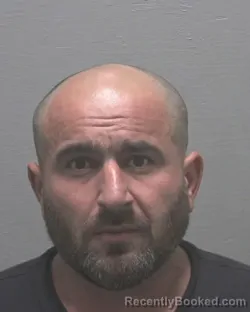 Mugshot of MAZHID ABIDOV booked in New Hanover County, North Carolina on July 8, 2026