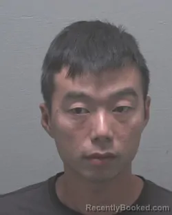 Mugshot of Dingan Hu booked in New Hanover County, North Carolina on August 27, 2026