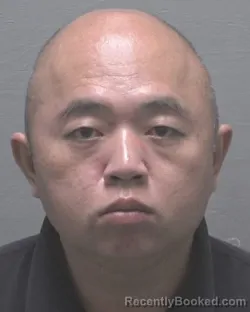 Mugshot of Jianbo Huang booked in New Hanover County, North Carolina on August 27, 2026