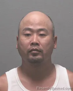 Mugshot of Jian Wang booked in New Hanover County, North Carolina on October 25, 2026