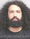Mugshot of Aaron Mahmood Adel booked in Somerset County, Maine on October 2, 2026