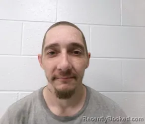 Mugshot of WILLIAM EDWARD RAVENSCROFT booked in Allegany County, Maryland on April 22, 2026