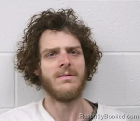 Mugshot of JUSTIN GAGE SUNSSUN