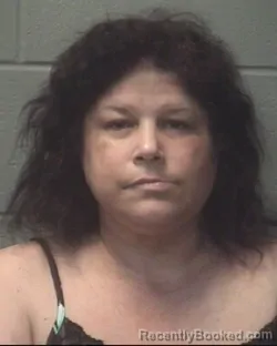Mugshot of Maria Delourdes Cruz booked in Onslow County, North Carolina on August 20, 2026