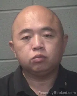 Mugshot of Jianbo Huang booked in Onslow County, North Carolina on August 26, 2026