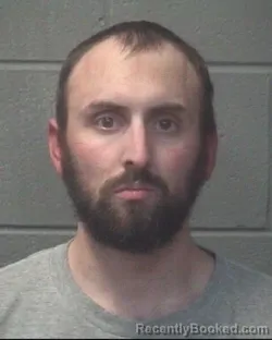 Mugshot of JUSTIN CRAIG THOMPSON