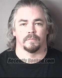 Booking photo from Orange County, North Carolina