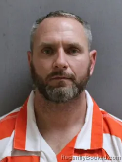Mugshot of Christopher Edward Rawlins booked in Pasquotank County, North Carolina on October 22, 2026