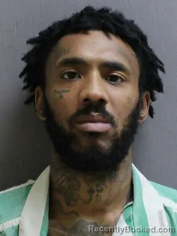 Mugshot of Dominique Thompson booked in Pasquotank County, North Carolina on August 6, 2026
