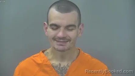 Mugshot of Christopher Michael Hill booked in Alpena County, Michigan on October 18, 2026