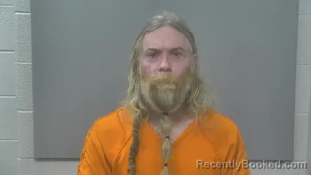 Mugshot of CASEY DONALD KREY booked in Alpena County, Michigan on April 13, 2026