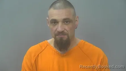 Mugshot of DOMINIC DENNIS CHAROBEE