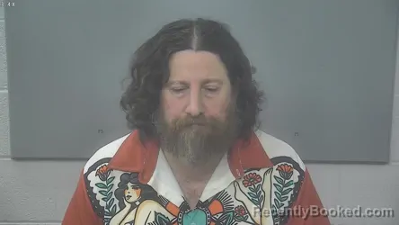 Mugshot of Douglas Stephen Haines booked in Alpena County, Michigan on October 8, 2026