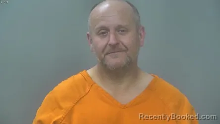 Mugshot of DOUGLAS RUSSELL SMITH booked in Alpena County, Michigan on April 24, 2026