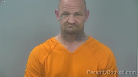 Mugshot of JOHN JASON KRIEG booked in Alpena County, Michigan on June 7, 2026