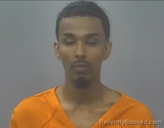 Mugshot of MALISHE AHMED ADAN booked in Alpena County, Michigan on July 24, 2026