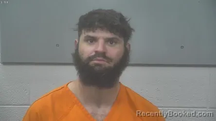 Mugshot of TRAVIS MICHAEL JOHNSON booked in Alpena County, Michigan on May 26, 2026