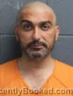 Mugshot of JEAN BERENJY booked in Pender County, North Carolina on May 10, 2026