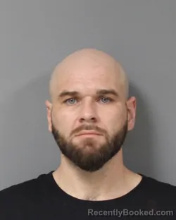 Mugshot of JUSTIN DAVID ROMHILT