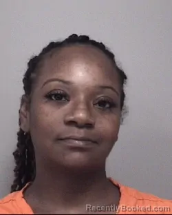 Mugshot of EBONI LARVETTER TUCKER-MOSLEY booked in Calhoun County, Michigan on March 18, 2026