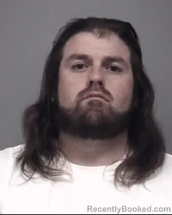Mugshot of JOSHUA MICHAEL BUZZO booked in Calhoun County, Michigan on July 9, 2026