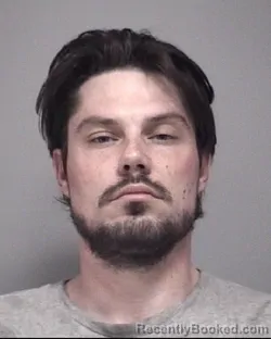 Mugshot of JOSHUA PAUL-FEGE KROSCHEL booked in Calhoun County, Michigan on May 20, 2026