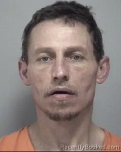 Mugshot of JUSTIN SCOTT TACKETT booked in Calhoun County, Michigan on March 26, 2026