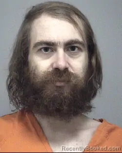 Mugshot of Travis Alan Batterson booked in Calhoun County, Michigan on August 21, 2026
