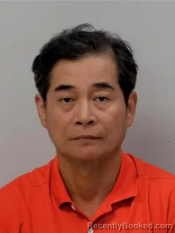 Mugshot of Qin Dongmin booked in Chippewa County, Michigan on July 17, 2026