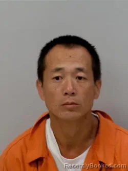 Mugshot of Chen Guohui booked in Chippewa County, Michigan on August 24, 2026