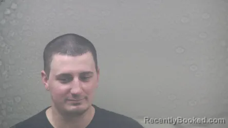 Mugshot of AUSTIN NICHOLAS GRANQUIST booked in Dickinson County, Michigan on March 21, 2026