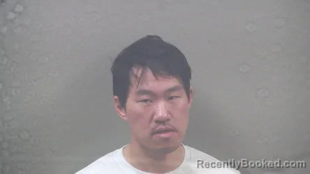 Mugshot of BENJAMIN CHARLES OLKKONEN booked in Dickinson County, Michigan on March 25, 2026