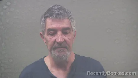 Mugshot of MELVIN DANIEL JR COUILLARD booked in Dickinson County, Michigan on March 26, 2026