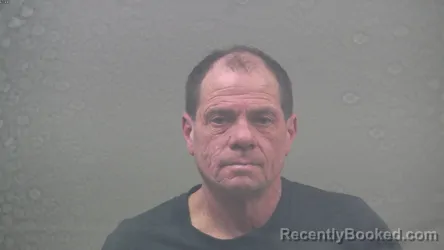 Mugshot of JOHN KEVIN SCHIRK booked in Dickinson County, Michigan on March 30, 2026