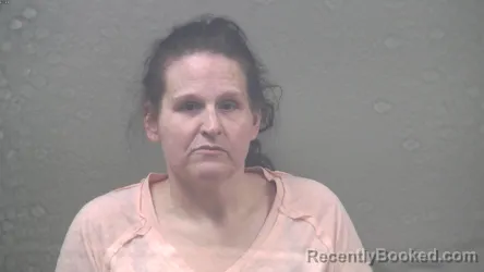 Mugshot of MELISSA RENEE CARNEY booked in Dickinson County, Michigan on March 31, 2026