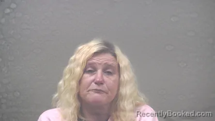 Mugshot of HEATHER MARIE WEST booked in Dickinson County, Michigan on April 4, 2026