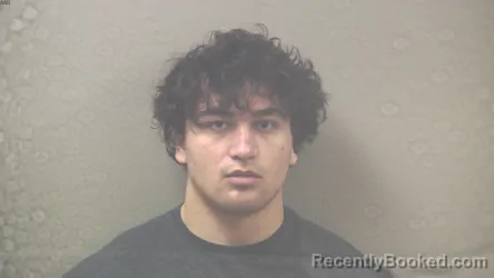 Mugshot of ELIZIN MARCUS ROUSE booked in Dickinson County, Michigan on May 10, 2026