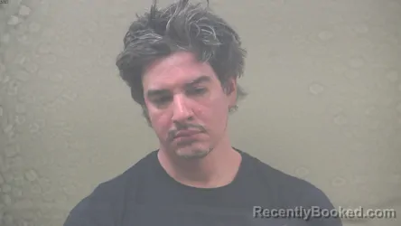 Mugshot of CHRISTOPHER PAUL MOMONT booked in Dickinson County, Michigan on May 31, 2026