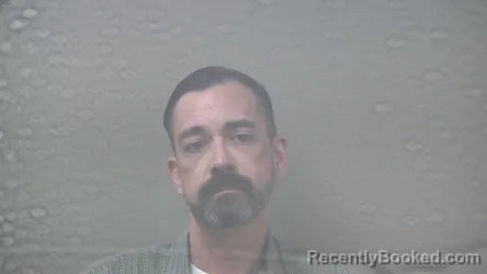 Mugshot of DANA JAMES SWANTON booked in Dickinson County, Michigan on June 18, 2026