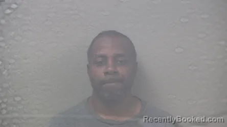 Mugshot of CORNELIUS III WOODS booked in Dickinson County, Michigan on June 20, 2026