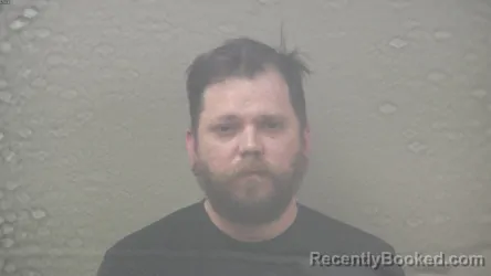 Mugshot of NICHOLAS JOHN MELLON booked in Dickinson County, Michigan on June 21, 2026