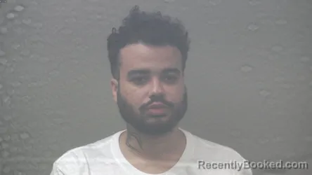 Mugshot of CALEB LAMONT CARROLL booked in Dickinson County, Michigan on July 8, 2026